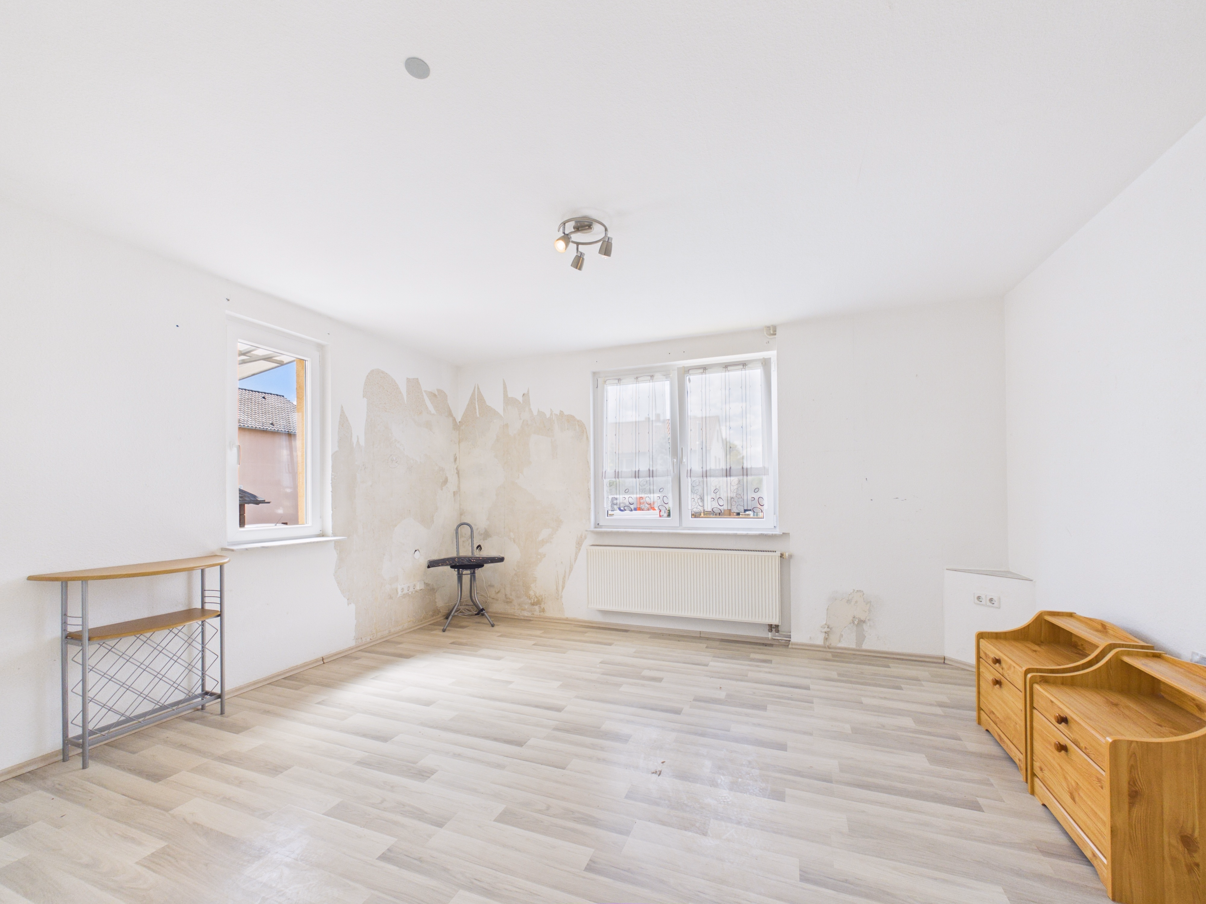 Wohn- und Schlafzimmer_Wohnung 1_EG