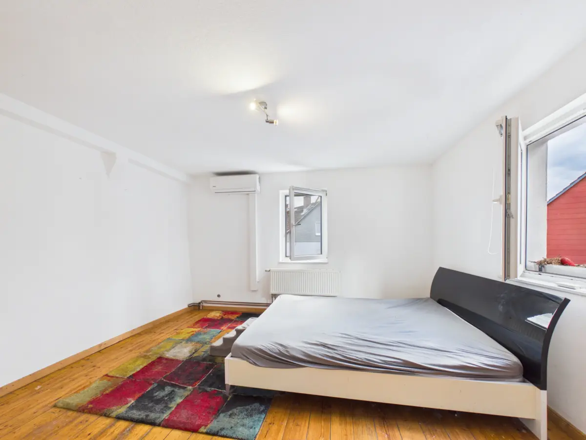 Schlafzimmer_2_1.OG.