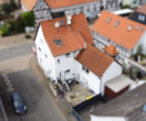 Luftansicht - Zweifamilienhaus mit individuellem Charme und großem Entwicklungspotenzial in Echzell